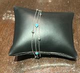 Triple chain bracelet with light blue bebeads