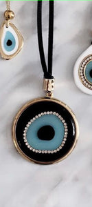 Long adjustable leather rope holding a large EvilEye pendant