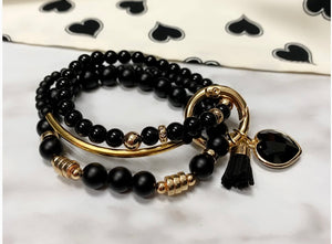 Timeless black and gold bracelets
