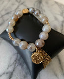 combination of grey and gold. Can be purchased separately.