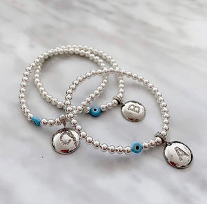 Necklace and bracelets with initials