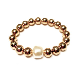 Artisan and bespoke gold bracelet with larger Pearl